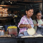 Food stalls in the evening market in Nahuizalco. El Salvador. Central America. (Photo by: Paolo Picciotto/REDA&CO/Universal Images Group via Getty Images)