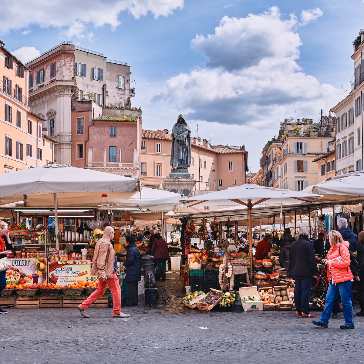 March 8, 2018: Traditional outdoor food market of Campo de Fiori (fields of flower), with the statue of Giordano Bruno in the background.
959994236
People Built Structure Food City History Architecture Nature Vacations Square Horizontal Three Quarter Length Outdoors Europe Tourist Monument Roman Italy Statue City Street Street Market - Retail Space Ancient Famous Place Rome - Italy Vegetable Fruit Flower Sky Agricultural Field Beauty Medium Group Of People Photography Tourism Travel Capital Cities Fiori Giordano Tradition
