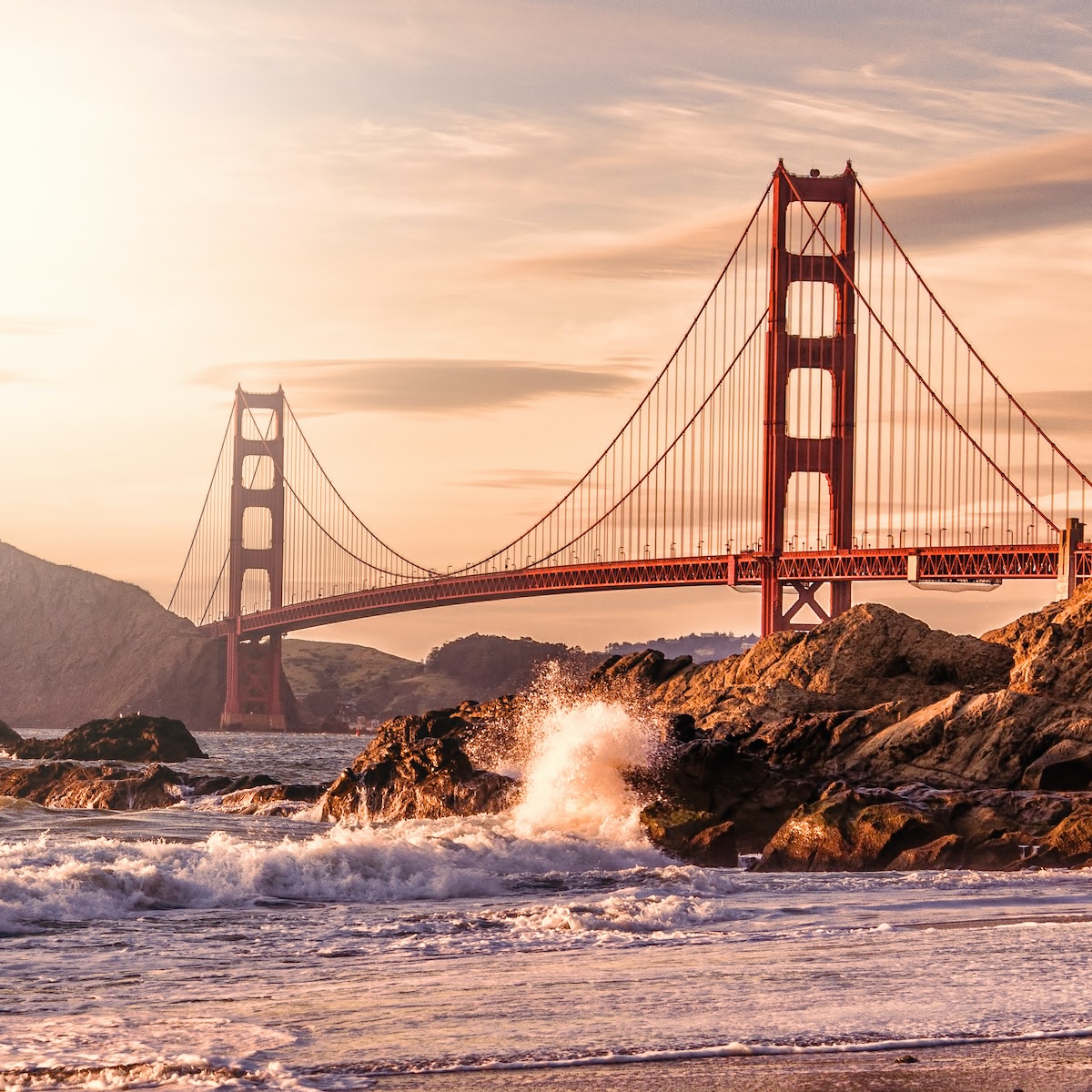 Golden Gate Bridge at the golden hour from Baker Beach.