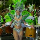 FUNCHAL, PORTUGAL - FEBRUARY 2020: Participants of Madeira island Carnival dancing in the parade in Funchal city, Madeira island, Portugal.