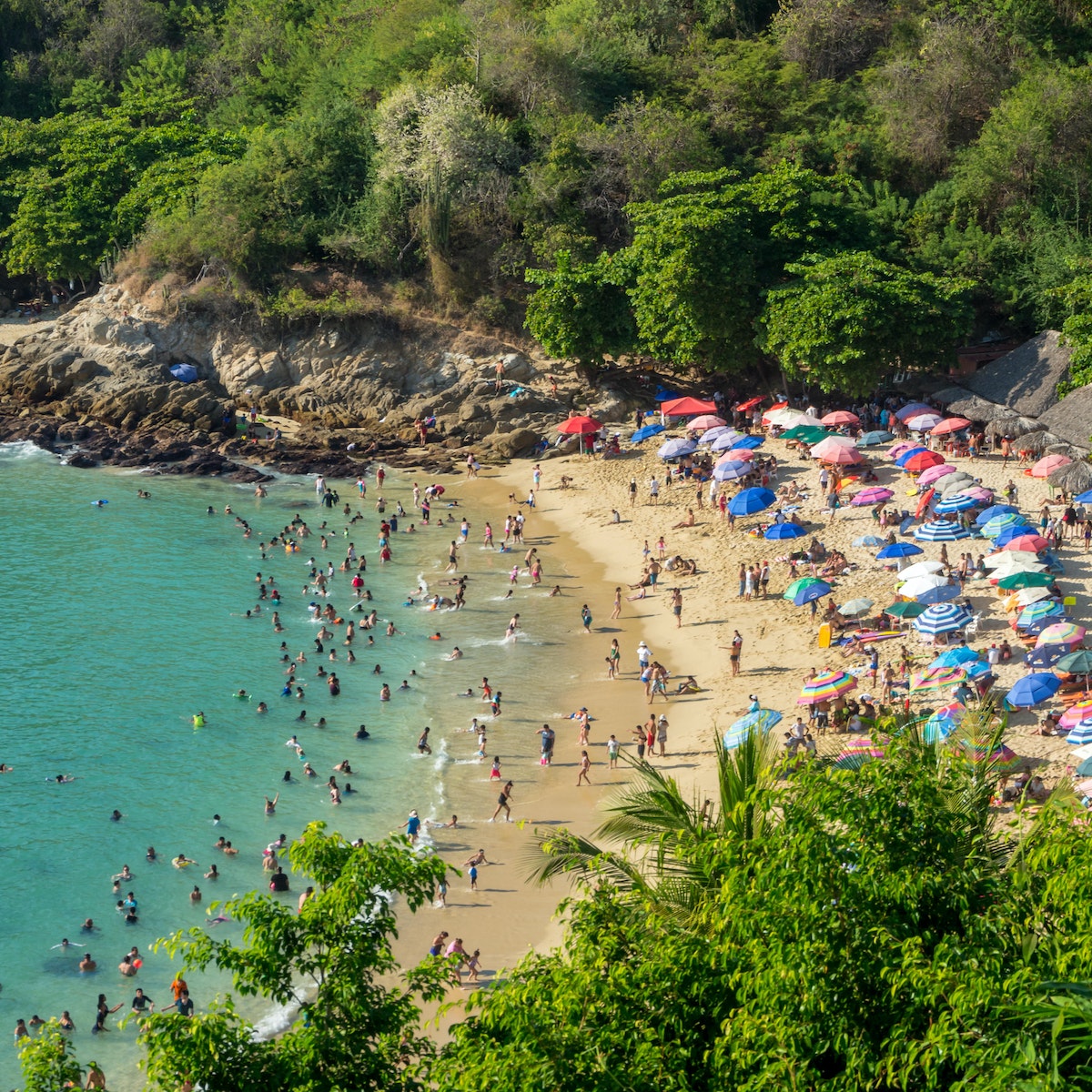 January 2018: The crowded beach of Playa Carrizalillo in Puerto Escondido.
1046221246
background, beach, beautiful, blue, carrizalillo, city, coast, color, crowded, day, escondido, green, holiday, landscape, manzanillo, mexico, natural, nature, oaxaca, ocean, outdoor, outdoors, pacific, palm, people, playa, puerto, relax, resort, sand, scenery, scenic, sea, shore, sky, summer, sun, sunny, sunset, tourism, tourist, town, travel, tropical, vacation, vallarta, view, water, wave, white