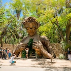 Tulum, Mexico. May 20, 2021.Beautiful towering wooden sculpture called "Ven a La Luz" welcomes guests onto the beach at Ahau Tulum in Mexico.; Shutterstock ID 1981632350; your: Ann Douglas Lott; gl: 65050; netsuite: Digital Content; full: Tulum beaches article refresh